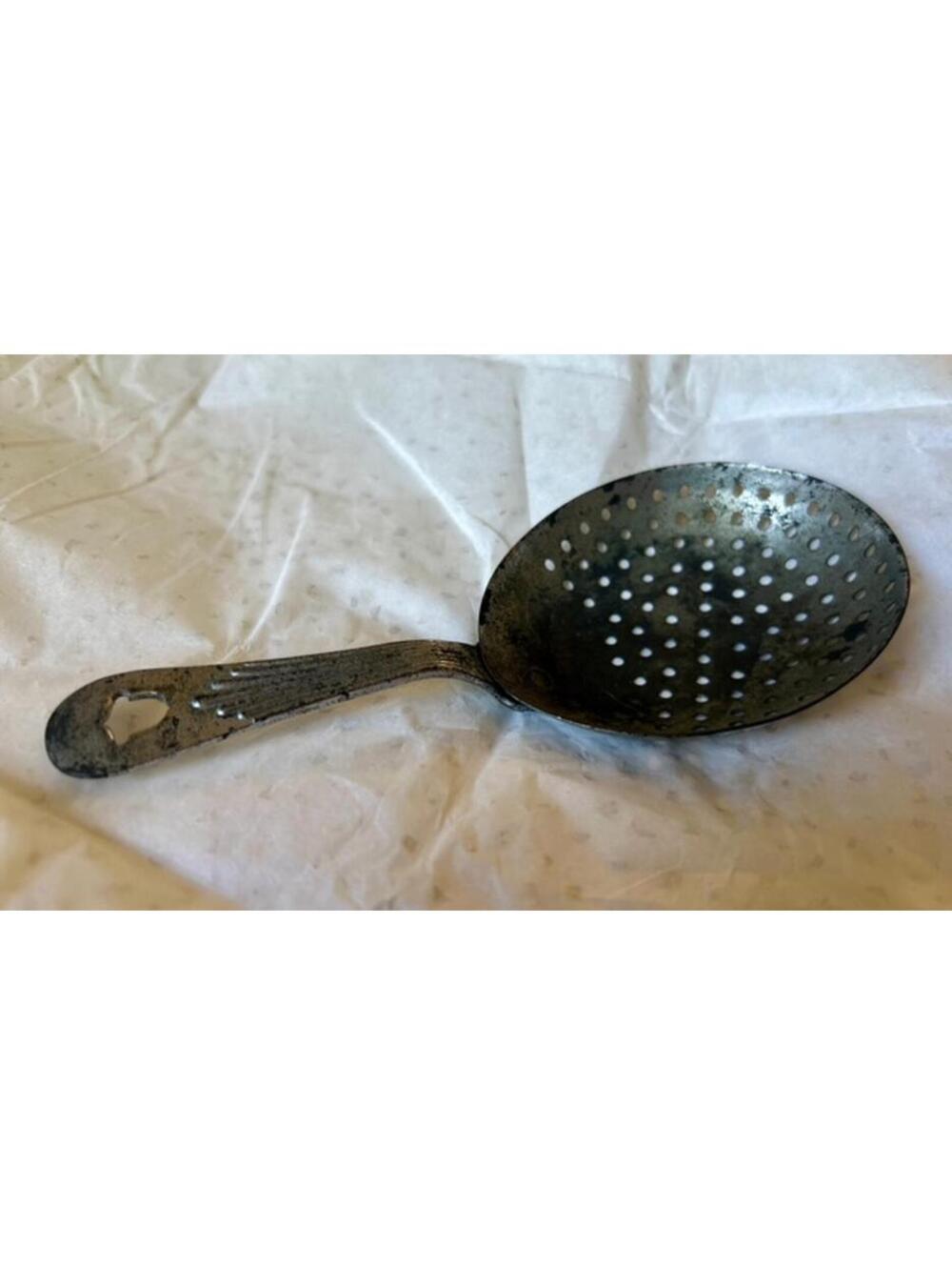 Vintage Metal Strainer Spoon with Decorative Handle